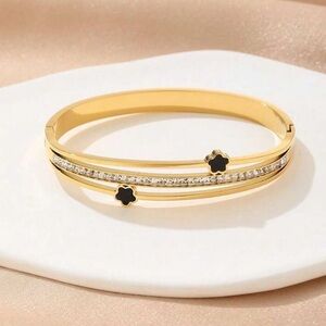 Gold plated stainless steel black flower rhinestone bangle bracelet